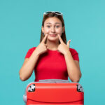 modern girl ready for travel for her dental treatment as dental tourism to mohali in india is increasing